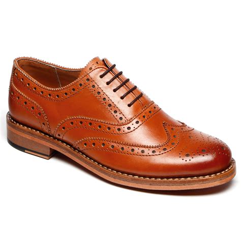 Leather brogue shoes .